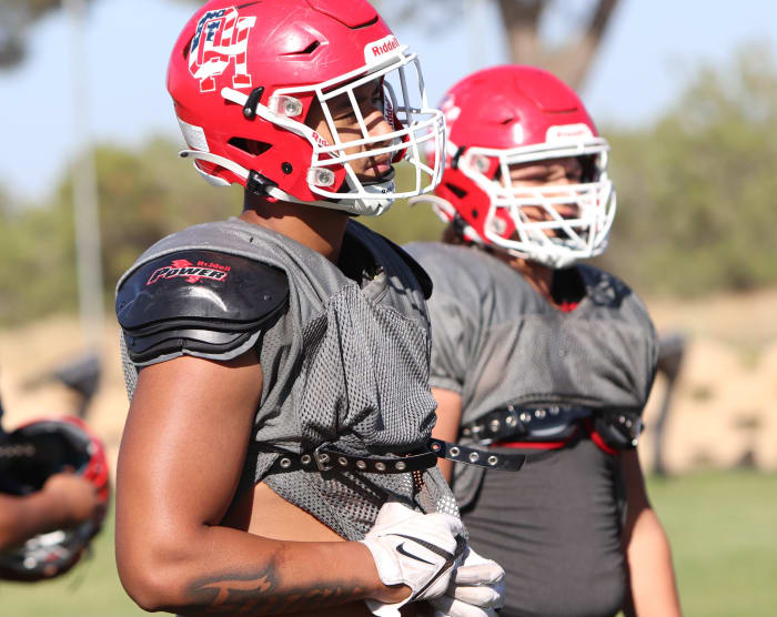 Paki Finau listening for instruction.